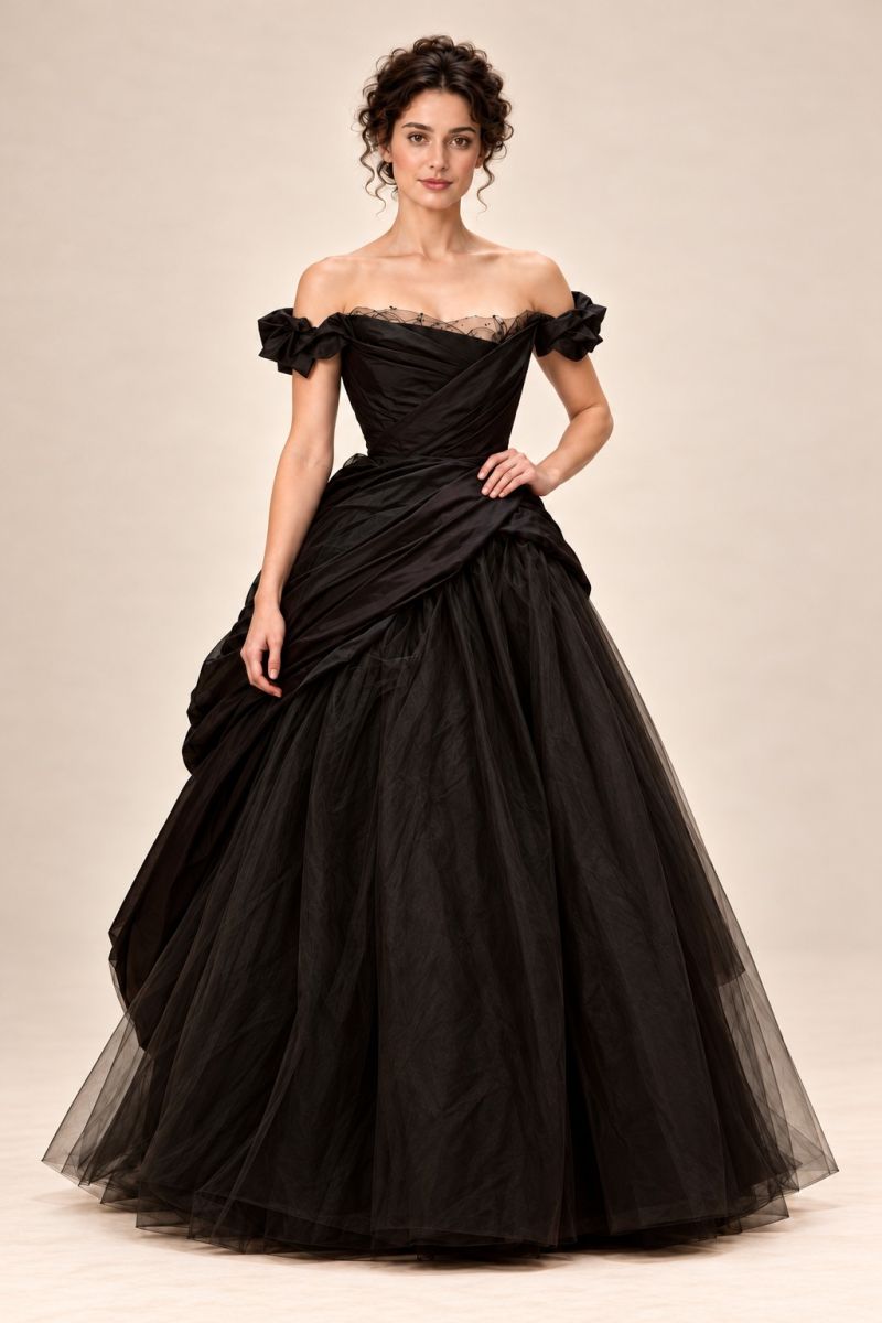 Black draped ball gown — alternative front pose with hand at waist