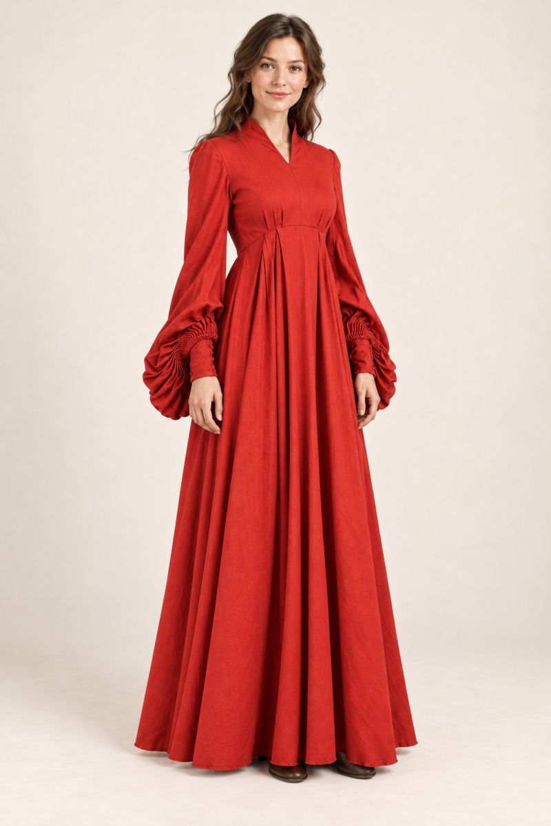 Red long-sleeve gown — gentle three-quarter front view