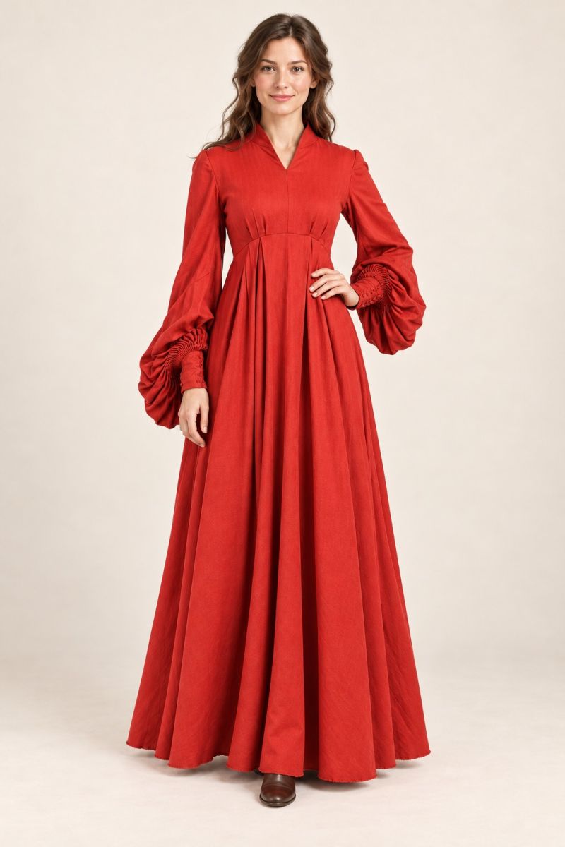 Red long-sleeve gown — alternative front pose with hand at waist