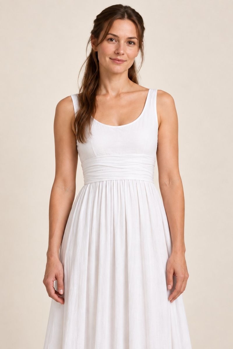 White empire-waist gown — closer front bodice and hip detail
