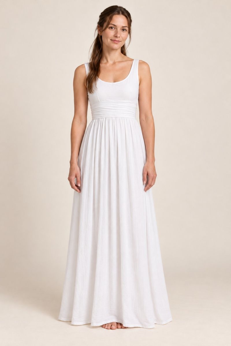White empire-waist gown — relaxed front full-length view