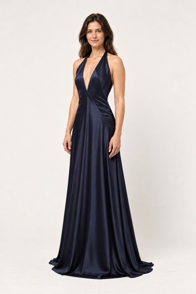 Navy halter evening dress — gentle three-quarter front view